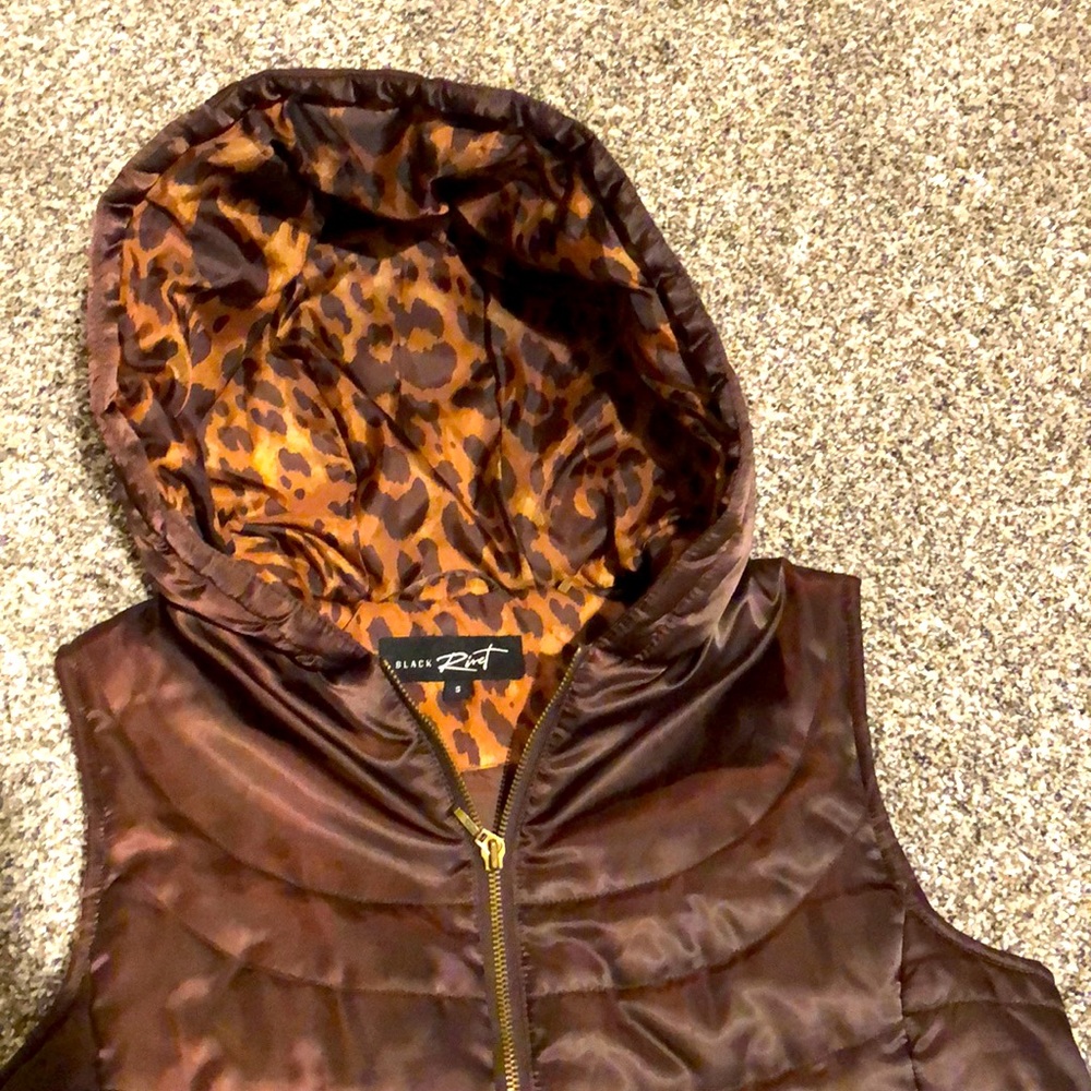 Black Rivet size small. Puffer hooded quilted vest. Brown Leopard.